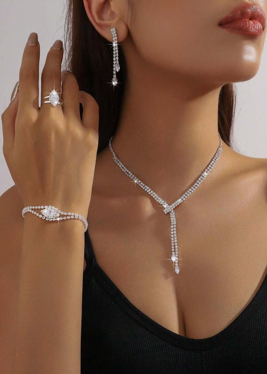 4-Silver Crystal Jewelry Set – Stunning Women's Necklace, Earrings, Bracelet, and Ring.