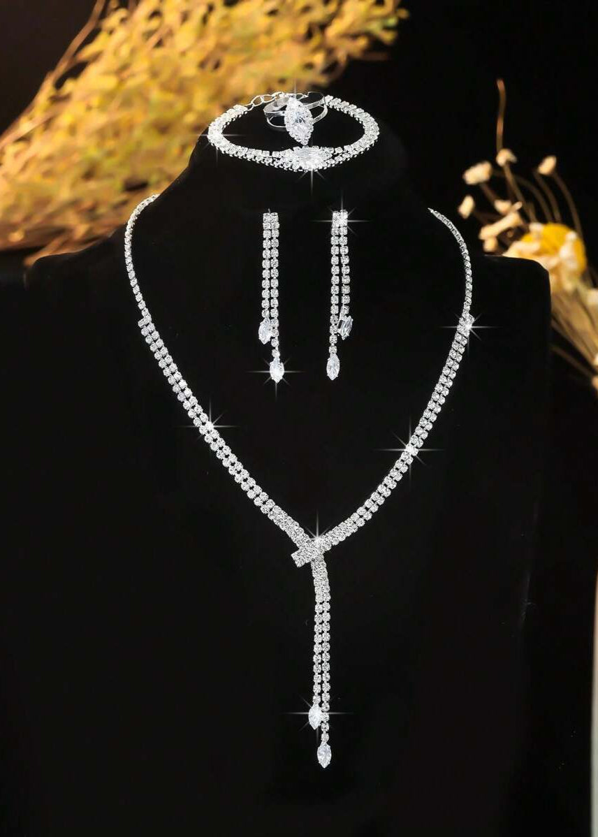4-Silver Crystal Jewelry Set – Stunning Women's Necklace, Earrings, Bracelet, and Ring.